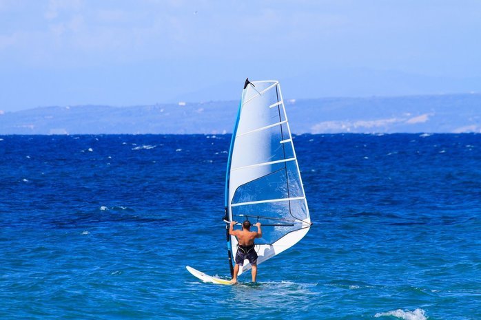 bigstock-Windsurfer-in-Zakythos-island--46351135-compressor