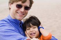 bigstock-Father-And-Son-Laughing-Togeth-60831413